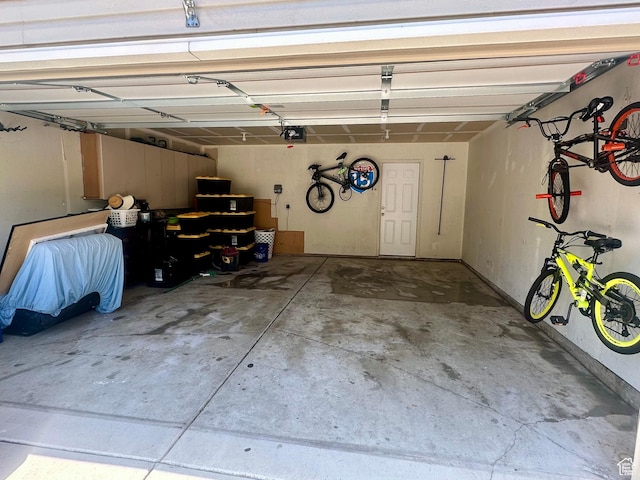 1485 N Monroe Blvd E, Ogden, UT 84404 - garage featuring a garage door opener