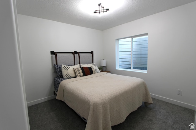 6255 N Wanlass Hl, Eagle Mountain, UT 84005 - bedroom with dark carpet and baseboards