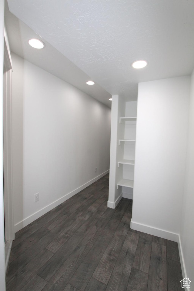 6255 N Wanlass Hl, Eagle Mountain, UT 84005 - below grade area featuring dark wood-type flooring and recessed lighting
