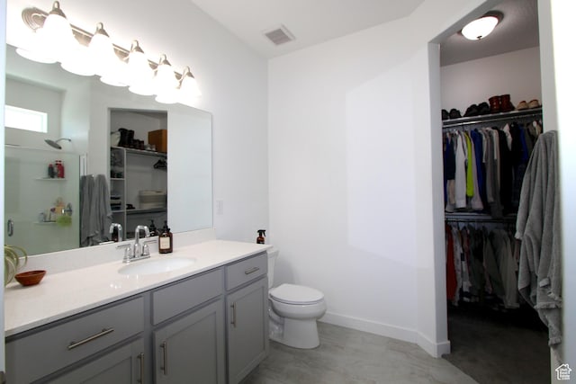 6255 N Wanlass Hl, Eagle Mountain, UT 84005 - full bathroom with vanity and a walk in closet