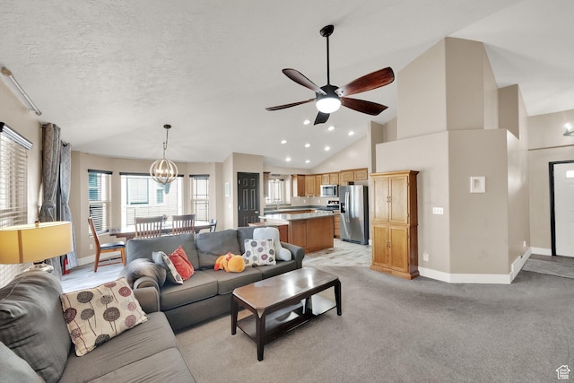 3424 W 4450 S, West Haven, UT 84401 - living room with a chandelier, lofted ceiling, ceiling fan, recessed lighting, and light colored carpet