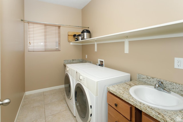 6628 N Malachite Way, Stansbury Park, UT 84074 - laundry room featuring washing machine and dryer and light tile patterned floors