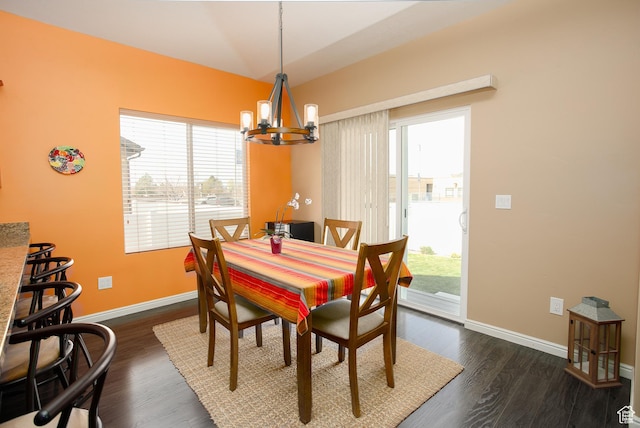 6628 N Malachite Way, Stansbury Park, UT 84074 - dining area with a chandelier, plenty of natural light, and dark wood-style flooring