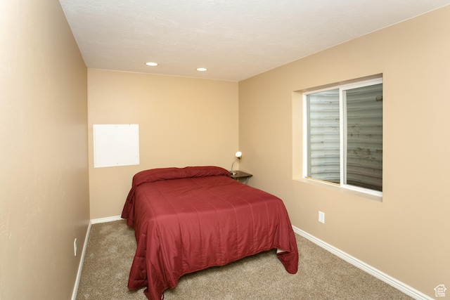 6628 N Malachite Way, Stansbury Park, UT 84074 - bedroom featuring carpet and recessed lighting