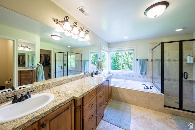 357 N Main St, Alpine, UT 84004 - bathroom with tile patterned flooring, double vanity, a stall shower, a garden tub, and a walk in closet