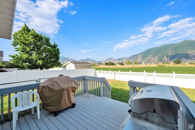 563 S 1850 E, Spanish Fork, UT 84660 - deck featuring a mountain view, a fenced backyard, grilling area, and a rural view