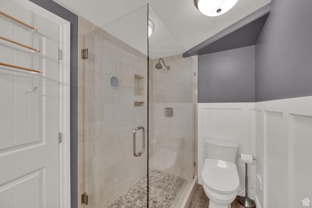 563 S 1850 E, Spanish Fork, UT 84660 - bathroom with a stall shower, a wainscoted wall, and wood finished floors