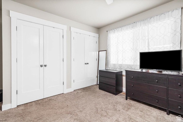 670 N 400 E, Nephi, UT 84648 - bedroom with light colored carpet and two closets