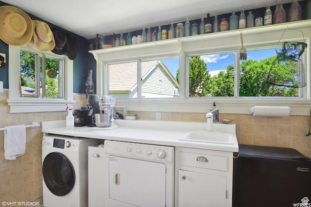 211 E 100 N, Midway, UT 84049 - kitchen with separate washer and dryer, healthy amount of natural light, white cabinets, and light countertops