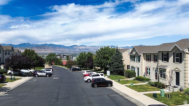 371 E Braidhill Dr, Draper, UT 84020 - view of asphalt street with sidewalks, a mountain view, and curbs