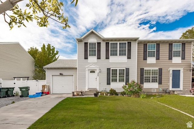 208 Alfred Dr, Tooele, UT 84074 - view of front of house featuring entry steps, a garage, and driveway