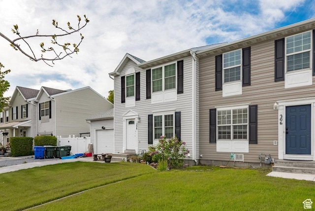 208 Alfred Dr, Tooele, UT 84074 - view of front facade with entry steps, a garage, and a front lawn