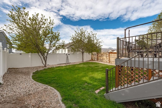 208 Alfred Dr, Tooele, UT 84074 - fenced backyard featuring stairs