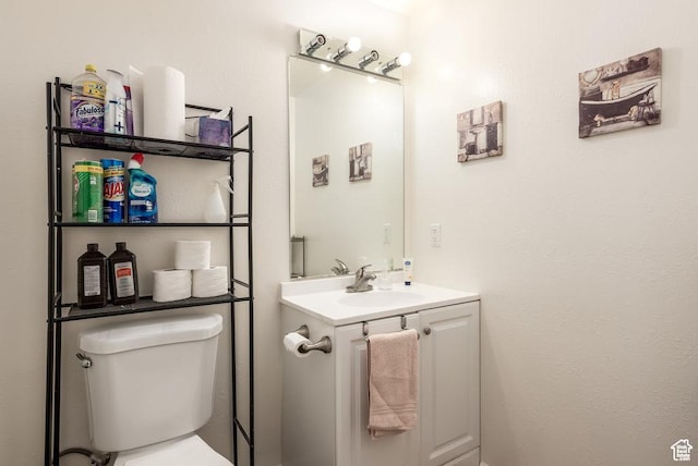 208 Alfred Dr, Tooele, UT 84074 - half bathroom featuring vanity and toilet