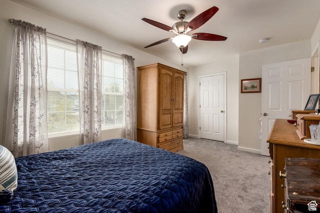 208 Alfred Dr, Tooele, UT 84074 - bedroom with light carpet and a ceiling fan