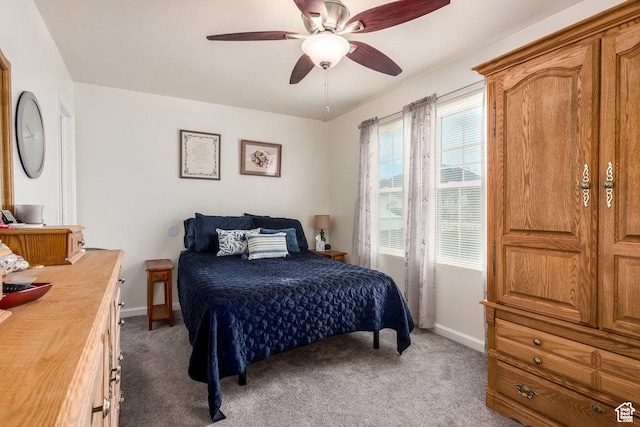 208 Alfred Dr, Tooele, UT 84074 - carpeted bedroom with baseboards and ceiling fan