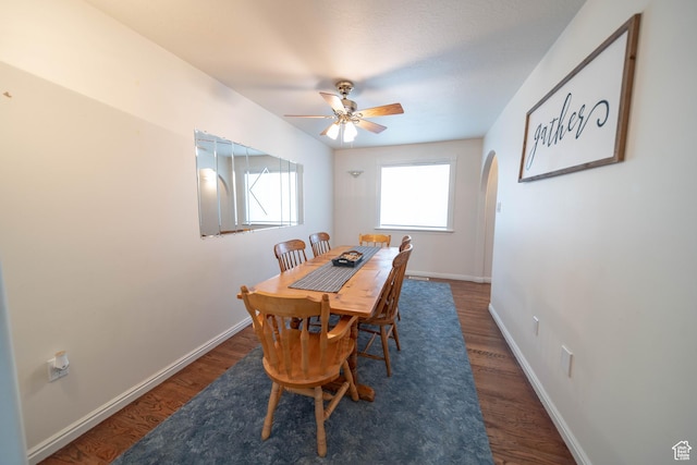 190 E 600 N, Ferron, UT 84523 - dining room featuring arched walkways, wood finished floors, and a ceiling fan