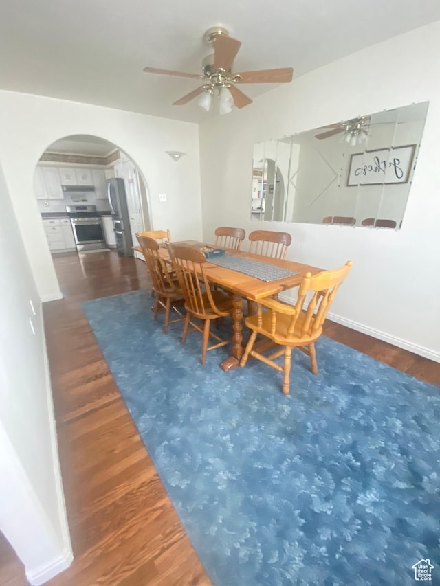 190 E 600 N, Ferron, UT 84523 - dining space featuring arched walkways, a ceiling fan, and wood finished floors