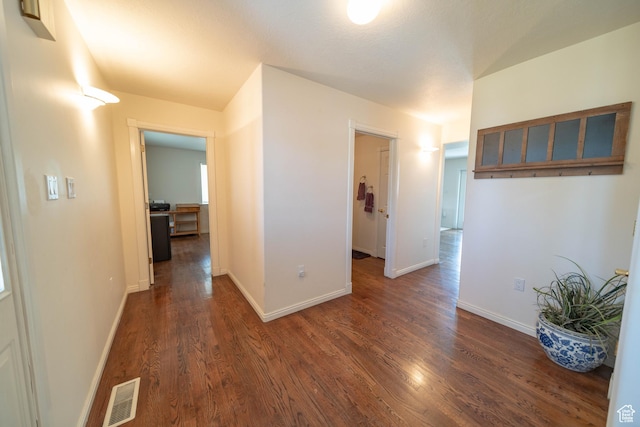 190 E 600 N, Ferron, UT 84523 - hallway featuring dark wood finished floors and baseboards