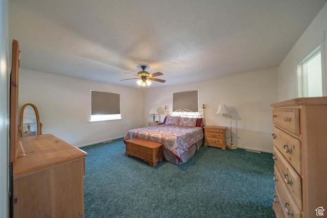 190 E 600 N, Ferron, UT 84523 - bedroom featuring dark colored carpet and a ceiling fan