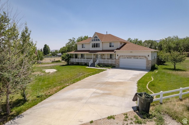 190 E 600 N, Ferron, UT 84523 - view of front of house featuring covered porch, a garage, concrete driveway, stone siding, and roof with shingles