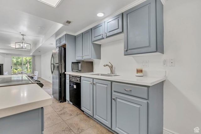2725 S 700 E Unit O, Salt Lake City, UT 84106 - kitchen with black appliances, gray cabinets, light countertops, and pendant lighting