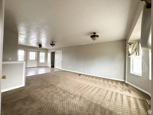 480 N 550 W, Huntington, UT 84528 - unfurnished room with carpet, a textured ceiling, and ceiling fan