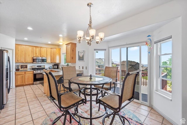 1721 E Lone Oak Dr, Draper, UT 84020 - dining space featuring light tile patterned floors, plenty of natural light, a chandelier, and recessed lighting