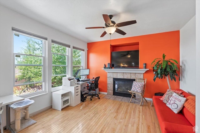1721 E Lone Oak Dr, Draper, UT 84020 - office area with hardwood / wood-style flooring, a fireplace, and a ceiling fan