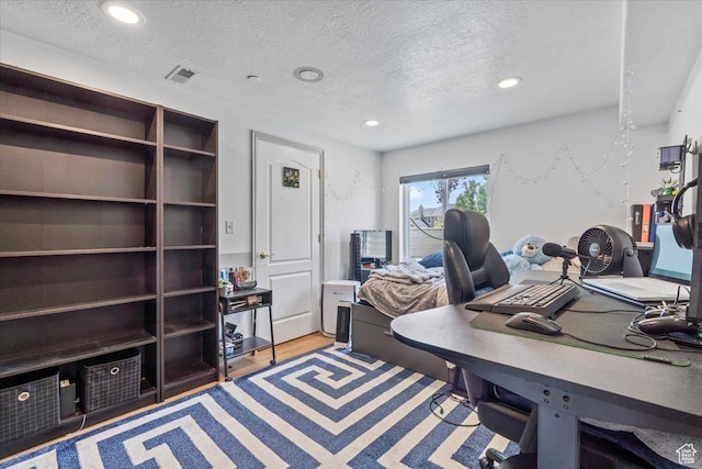 1721 E Lone Oak Dr, Draper, UT 84020 - office area with a textured ceiling, recessed lighting, and light wood-type flooring