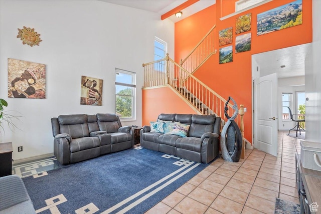 1721 E Lone Oak Dr, Draper, UT 84020 - living room featuring plenty of natural light, light tile patterned floors, stairway, a towering ceiling, and beamed ceiling