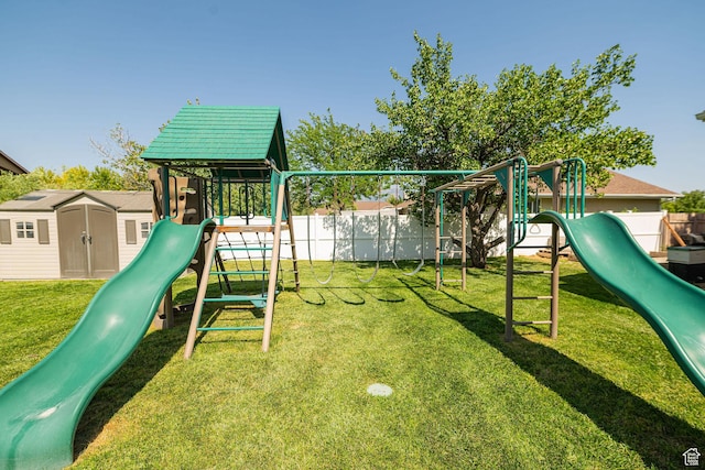 2524 W Martingale Cir S, South Jordan, UT 84095 - view of jungle gym featuring a fenced backyard and a storage unit