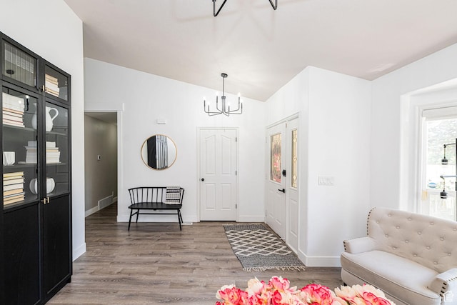 2524 W Martingale Cir S, South Jordan, UT 84095 - foyer entrance featuring a chandelier, wood finished floors, and vaulted ceiling