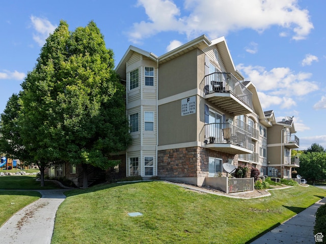 2119 N Aurora Way Unit F, Saratoga Springs, UT 84045 - view of apartment building / complex