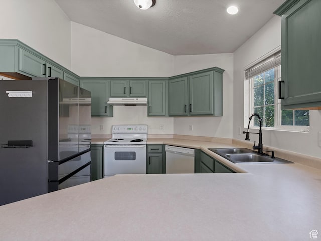 2119 N Aurora Way Unit F, Saratoga Springs, UT 84045 - kitchen with white appliances, green cabinetry, vaulted ceiling, light countertops, and under cabinet range hood