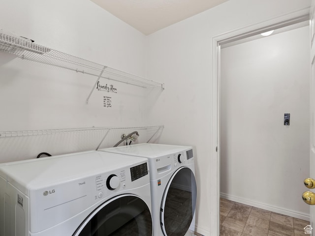 2119 N Aurora Way Unit F, Saratoga Springs, UT 84045 - washroom featuring baseboards and washing machine and clothes dryer
