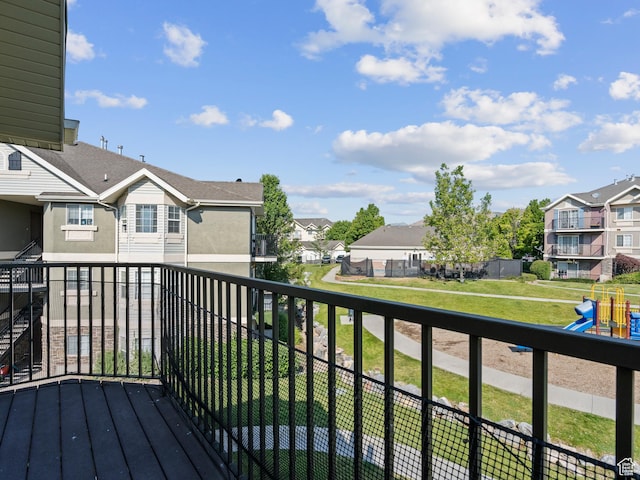 2119 N Aurora Way Unit F, Saratoga Springs, UT 84045 - wooden deck with a residential view and a playground
