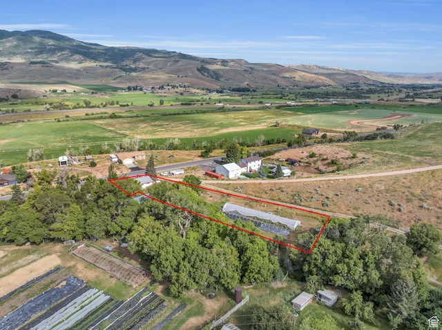 1455 S Hoytsville Rd, Coalville, UT 84017 - aerial view of property's location with property boundaries highlighted, rural landscape, and a mountain backdrop