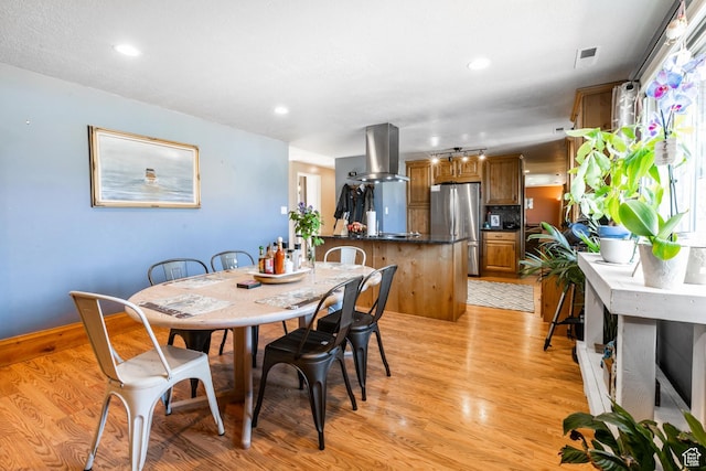 1455 S Hoytsville Rd, Coalville, UT 84017 - dining space featuring light wood-type flooring and recessed lighting