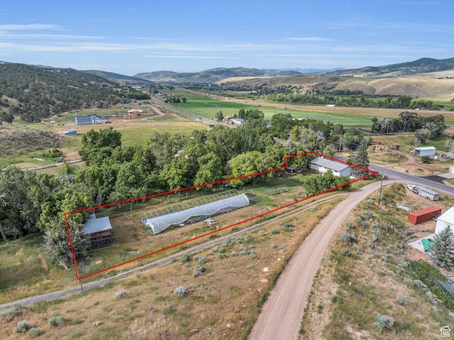1455 S Hoytsville Rd, Coalville, UT 84017 - aerial view of sparsely populated area with property boundaries highlighted and a mountain backdrop