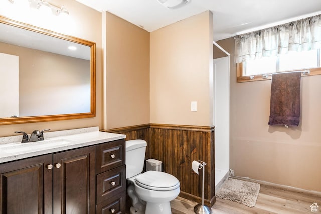 1455 S Hoytsville Rd, Coalville, UT 84017 - full bathroom with wood finished floors, a shower stall, vanity, a wainscoted wall, and wood walls
