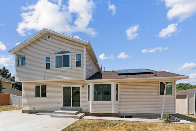 2198 N 1600 E, Layton, UT 84040 - rear view of property with solar panels, a patio, and entry steps