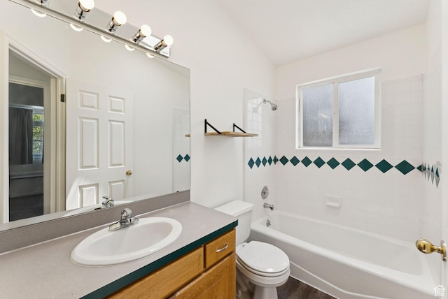 2198 N 1600 E, Layton, UT 84040 - bathroom featuring vanity, washtub / shower combination, and wood finished floors