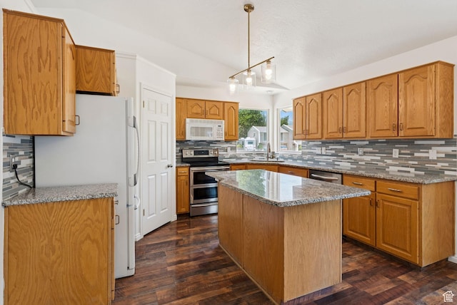 2198 N 1600 E, Layton, UT 84040 - kitchen with white appliances, tasteful backsplash, stone counters, and dark wood finished floors