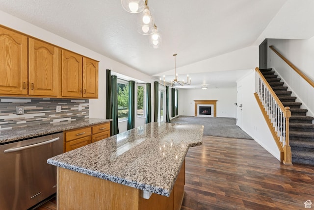 2198 N 1600 E, Layton, UT 84040 - kitchen featuring stainless steel dishwasher, lofted ceiling, stone counters, backsplash, and open floor plan