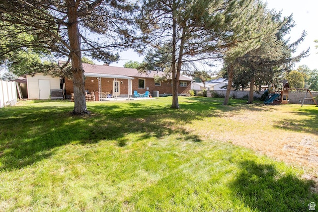 1471 W Stern Dr S, Taylorsville, UT 84123 - view of yard featuring a playground and a patio