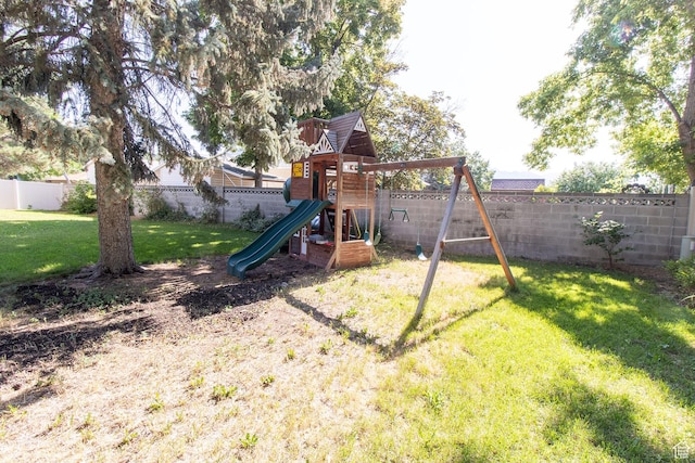 1471 W Stern Dr S, Taylorsville, UT 84123 - view of playground with a fenced backyard