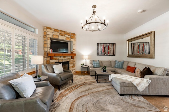 5596 N Oslo Ln, Park City, UT 84098 - living room with a chandelier, healthy amount of natural light, wood finished floors, and a stone fireplace