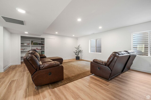 10617 S Split Rock Dr, South Jordan, UT 84009 - living room with light wood-type flooring and recessed lighting
