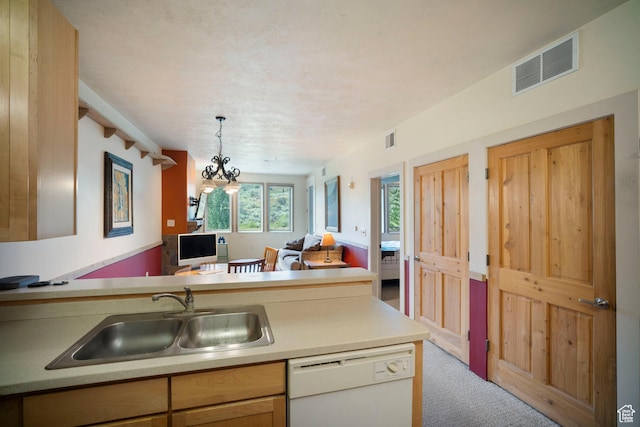 6605 N 2200 W Unit E205, Park City, UT 84098 - kitchen with white dishwasher, carpet flooring, open floor plan, light countertops, and pendant lighting
